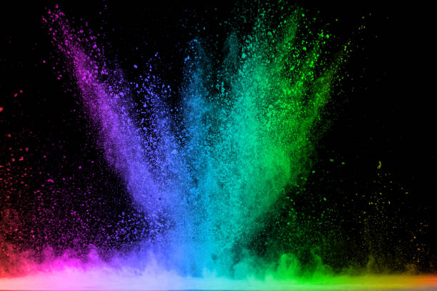 istock Explosion of colored powder isolated on black background. Abstract colored background 1286607594