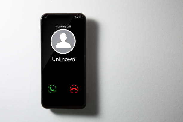 Unknown incoming call Unknown incoming call scammer stock pictures, royalty-free photos & images