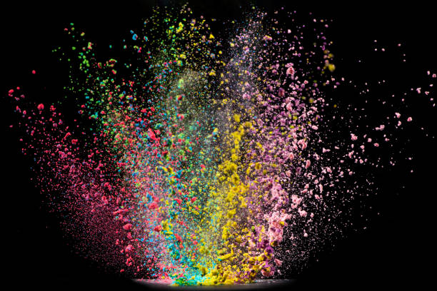 istock Explosion of colored powder isolated on black background. Abstract colored background 1286609428