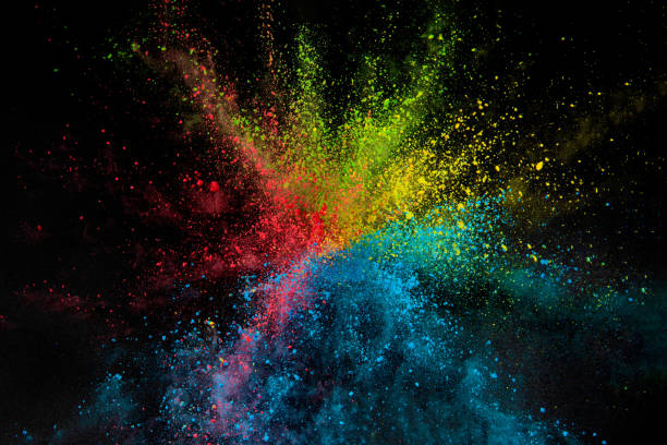 istock Explosion of colored powder isolated on black background. Abstract colored background 1286609430