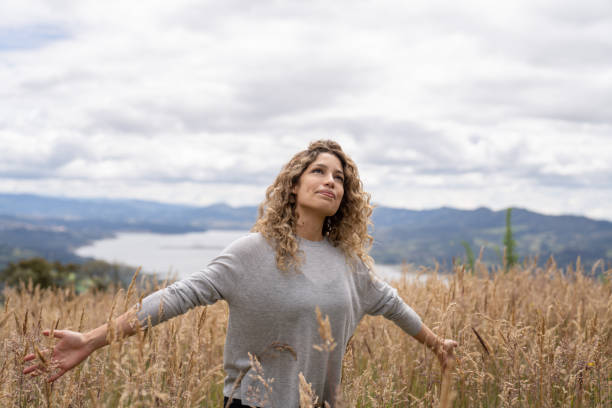 istock Woman enjoying nature while talking a walk in the mountains 1286610213