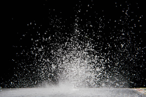 istock Explosion of white powder on black background. Abstract colored background 1286611179