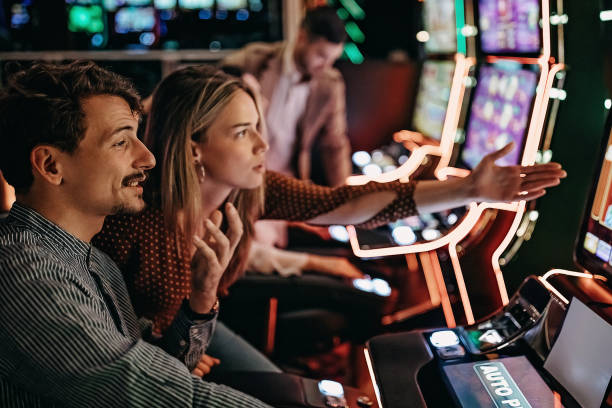 istock Friends gambling in casino 1286612954