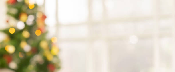 istock abstract blur decorated christmas ornament pine tree in home interior background for show,ads,design product on display concept in merry xmas and happy new year season concept 1286615654