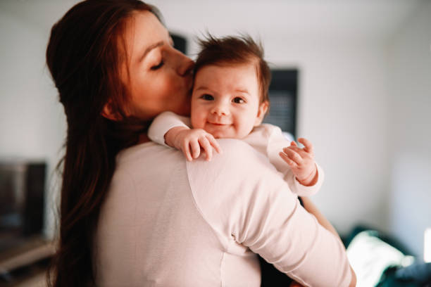istock Mom relaxing at home with her baby boy 1286617173