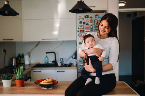 istock Mom relaxing at home with her baby boy 1286617328