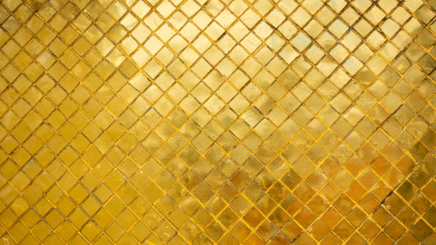 istock Gold tile mosaic wall glitter background texture Luxury and Elegant 1286618843