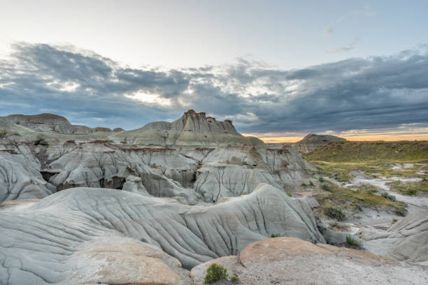 Badlands of Dinosaur Provincial Park at Sunset in Alberta, Canada Badlands of Dinosaur Provincial Park at sunset in Alberta, Canada. drumheller valley stock pictures, royalty-free photos & images