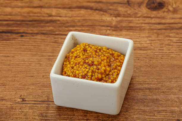 istock Dijon mustard sauce with seeds 1286621672