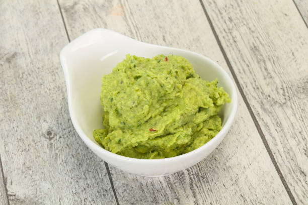 istock Avocado guacamole sauce with chili pepper 1286621690