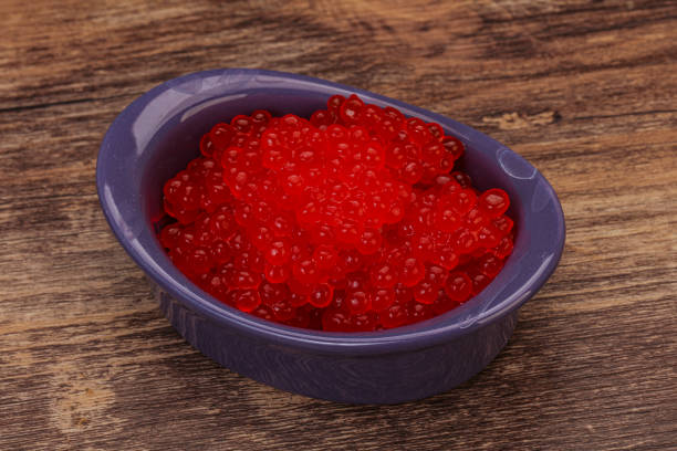 istock Red salmon caviar in the bowl 1286621733