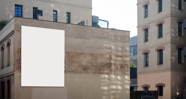 Blank billboard on the wall of building