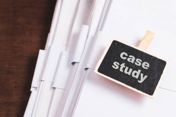 Case Study on Files Case Study text on wood sign placed on the pile of category paper files case study stock pictures, royalty-free photos & images