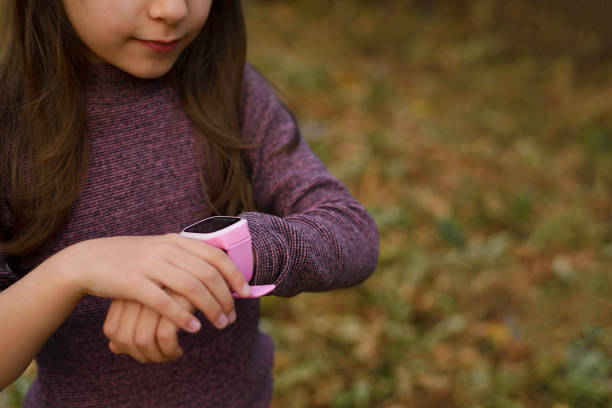 istock Pink children's smart watch. Protection and control. 1286628414