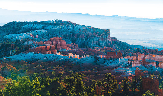 Aerial view along the rim of the Bryce Canyon and its natural amphitheater and the rock hoodoos below.