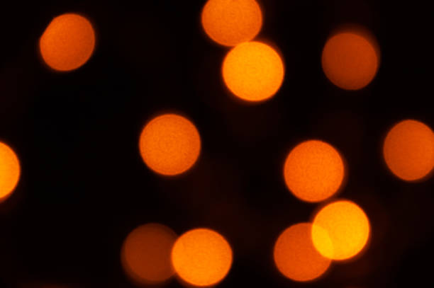 istock Defocused golden bokeh on black background. abstract background. Bokeh Christmas 1286629650