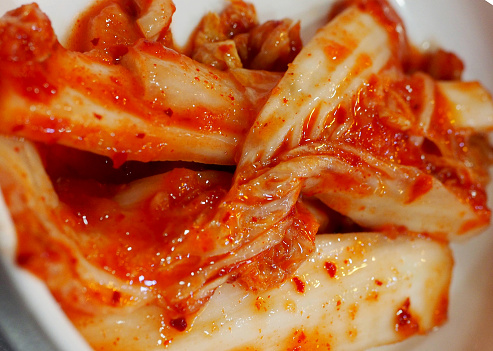 closeup cabbage kimchi (red Korean sauce marinated)
