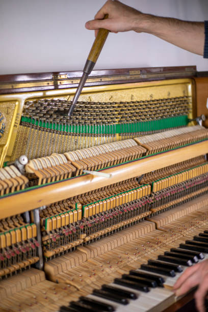 istock tune piano, piano tune, tuner, musical., vertical, 1286631633