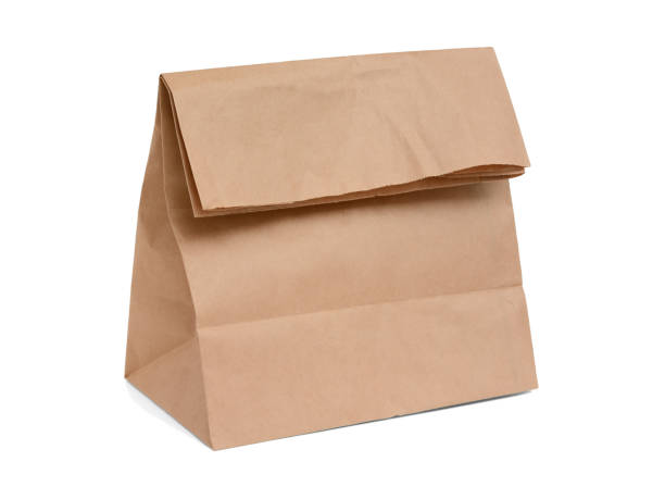 istock Paper bag for lunch and sandwiches. Isolated on a white background with shadow 1286634443