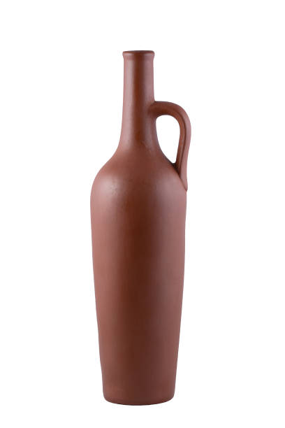 istock Clay jug with handle for storing wine, isolated on a white background. 1286635909