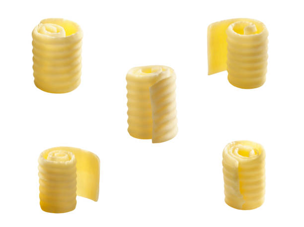 istock Set of different butter rolls or swirl or curls isolated on white background creamy soft butter 1286637573