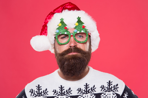 New year, new you. Bearded man wear christmas tree party glasses. Santa man with long beard and mustache. Hipster man with festive playful look. Unshaven man in winter style.