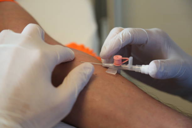 istock Nurse's hand taking a blood sample from the patient's vein before surgery. 1286639825