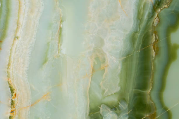 istock Light onyx texture with green tracery. Background for your personal use. 1286639900