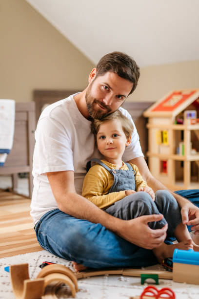 istock Portrait of a young father and his son 1286639922