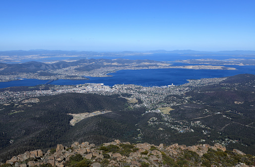 Hobart, Capital City of Tasmania, viewed from Mt Wellington. Wrest Point Casino and the Tasman Bridge visible on the Shoreline of the Derwent River. Canon 5DMkii Lens EF24-70mm f/2.8L USM ISO 50