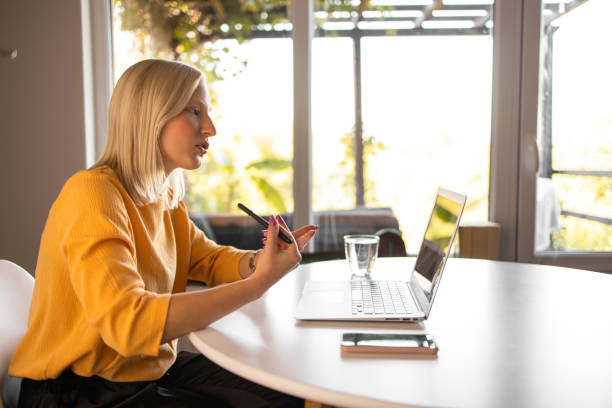 istock Young woman working from home 1286642528