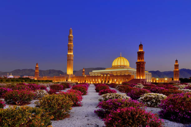 Sultan Qaboos Grand Mosque, Bousher, Sultanate of Oman. The full name of this magnificent iconic structure is the "Sultan Qaboos Grand Mosque", which dominates the skyline of Muscat.This architectural masterpiece is Oman’s pride and joy. Located in Bawshar, the mosque is home to the world’s second largest hand-woven carpet as well as a one of the largest chandeliers in the world which is decorated with hundreds of Swarovski crystals. Its Opened in 2001, this is the only mosque in Oman open to non-Muslims and one of the largest in the Gulf sultan stock pictures, royalty-free photos & images