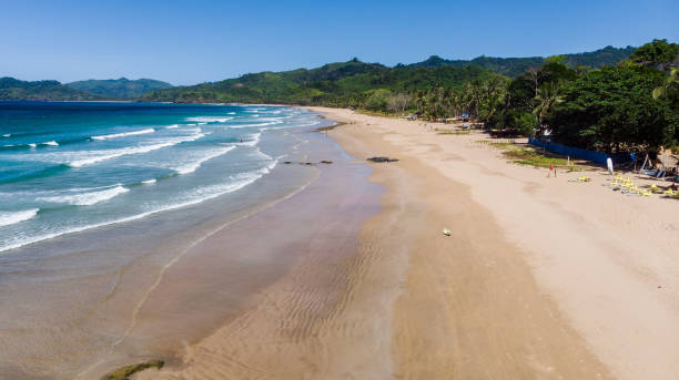 istock Surfing in Duli beach, El Nido, Palawan 1286648371