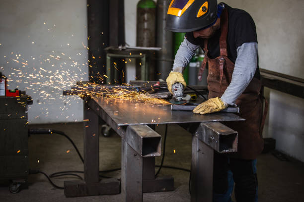 istock Metal Worker with the grinder 1286649817