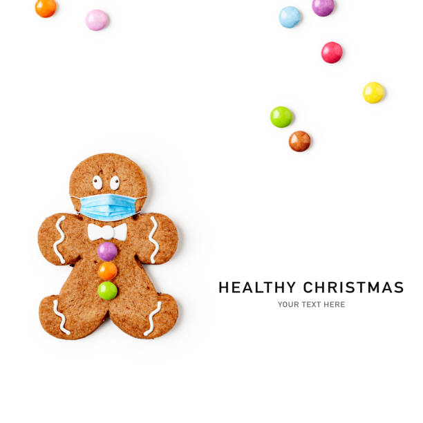 istock Gingerbread man with medical mask 1286651799