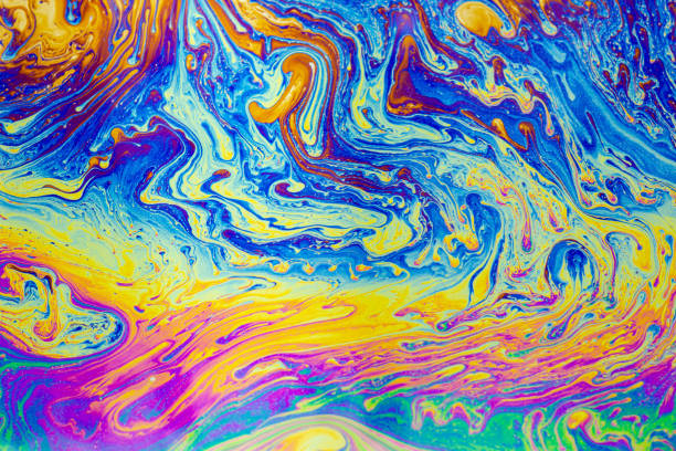 istock Psychedelic multicolored patterns background. Photo macro shot of soap bubbles 1286651810