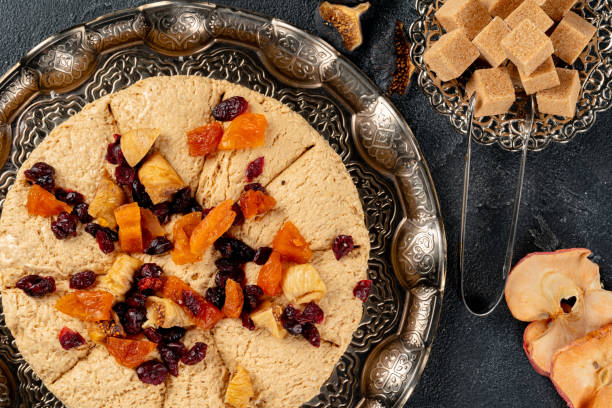 istock Halva with dried fruits on arabic dishware 1286653178