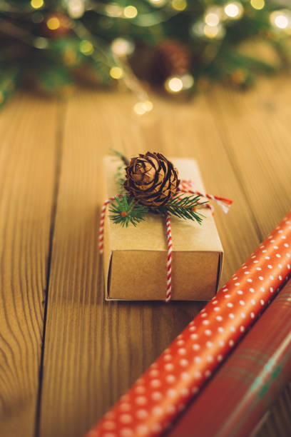 istock Preparation for celebrating Christmas and New Year. Gift decoration, Christmas tree decoration.Christmas New Year Celebration Decorations Concept.Selective focus.Copy space 1286659486