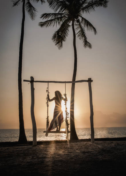 istock Beautiful girl on the beach wearing a bikini 1286659595