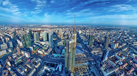 Beautiful panoramic aerial drone view on Warsaw City Skyscrapers, PKiN, and Varso Tower (the tallest skyscraper in the European Union) under construction, Warsaw, Poland, EU