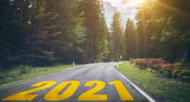 istock 2021 New Year road trip travel and future vision concept . 1286665401