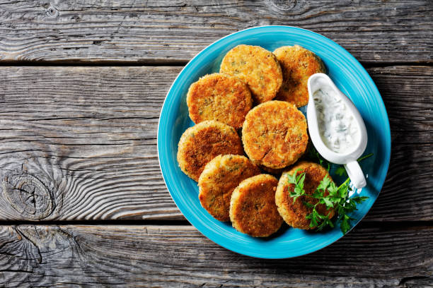 White fish cakes of white fish fillet: cod or haddock with potato and parsley