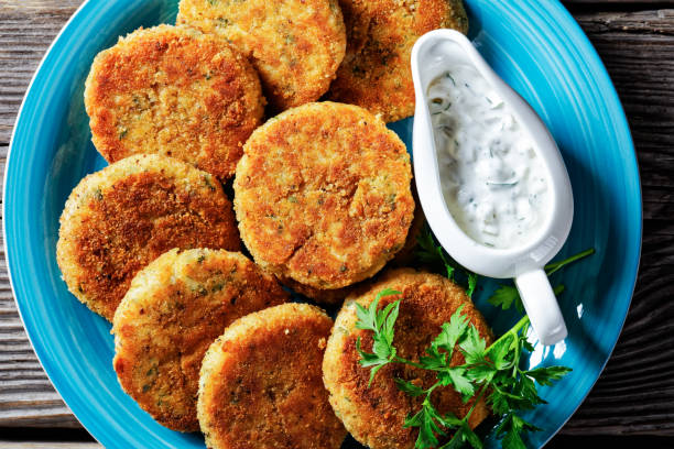 istock White fish cakes of white fish fillet: cod or haddock with potato and parsley 1286668294
