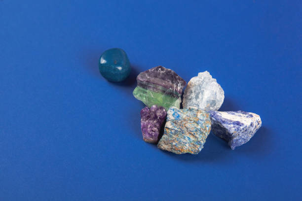 istock Natural minerals, precious stones on classic blue background 1286669795