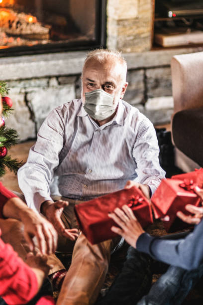 istock present exchaning at home for christmas during the covid 1286670994