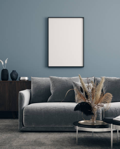 istock Poster mock up in modern interior background, dark room with bouquet on table 1286671069