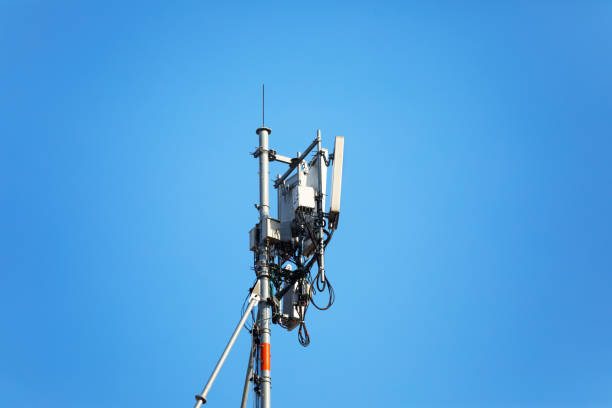 istock 4g and 5g antennas in blue sky in Bangkok 1286671166