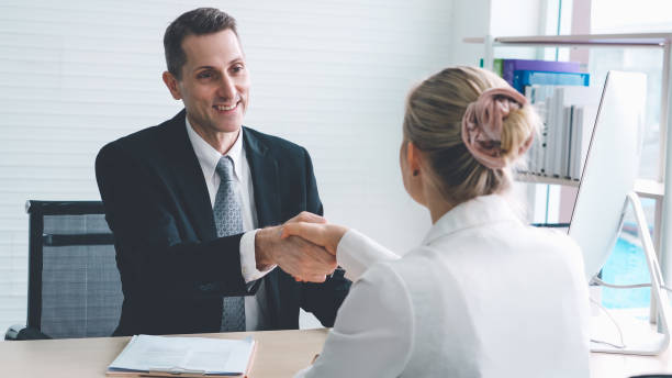 istock Job seeker and manager handshake in job interview 1286671405