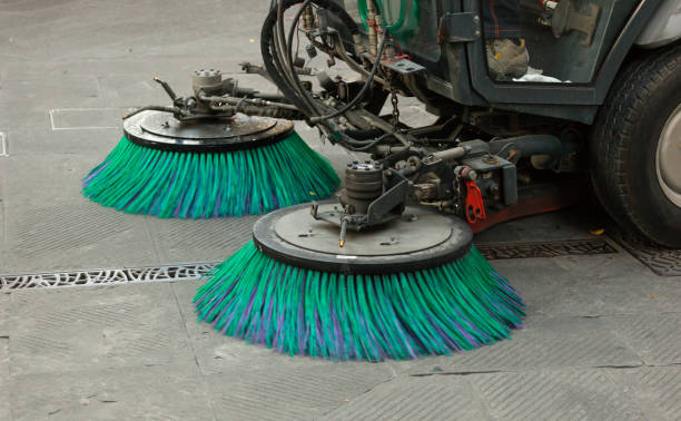 istock High Angle View Of Sweeper Truck Cleaning Footpath 1286672486