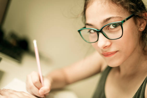 istock Young girl studding at home 1286673834